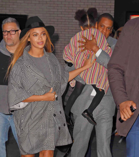 In Kisua leaving the Annie premiere in New York City.
