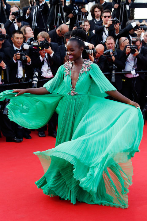In Gucci Première with Chopard jewelry.