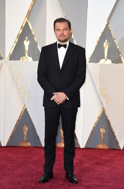In Giorgio Armani Made to Measure suit and Christian Louboutin shoes.