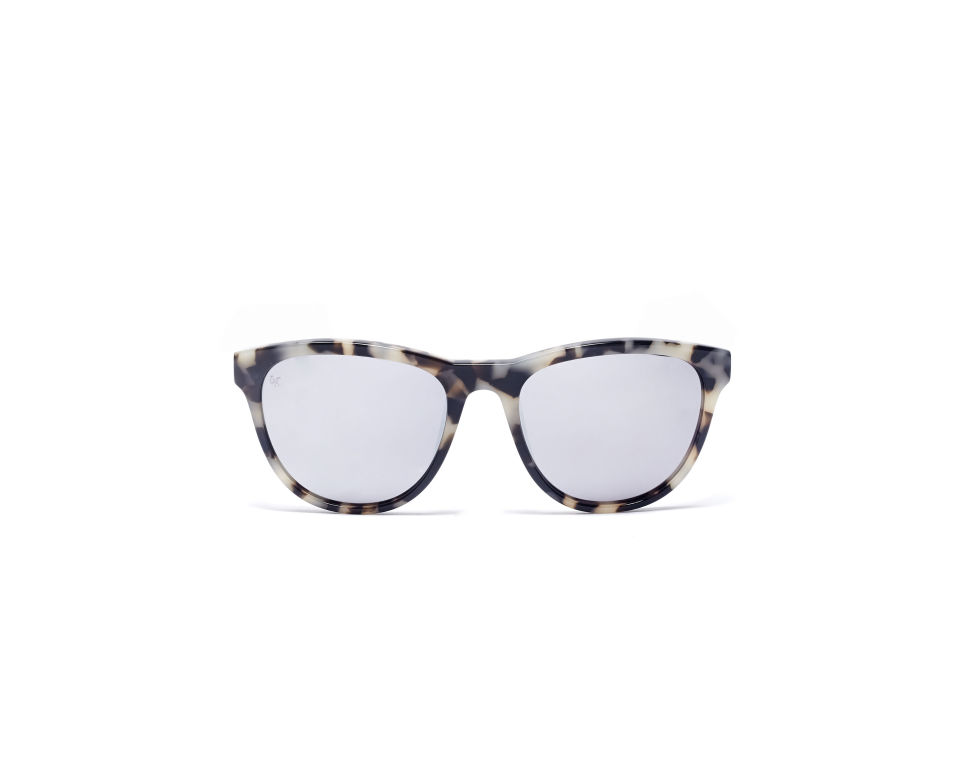A pair of gray and white tortoise shell sunglasses will carry you from season to season, working equally as well with a sundress as they would your winter parka. Smoke x Mirrors Passenger Sunglasses, $295; smokexmirrors.com