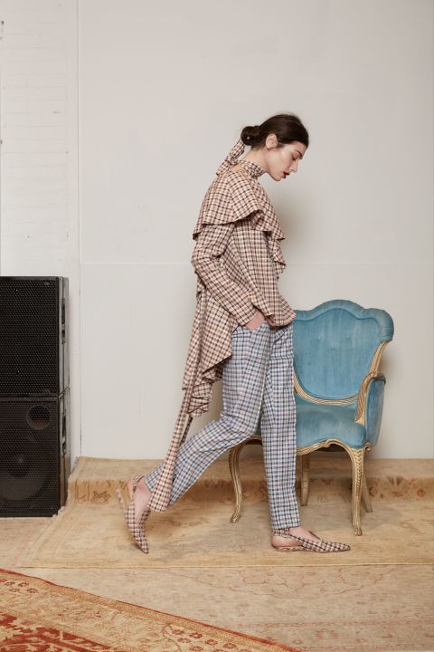 1) Gives you such a pretty profile. 2) Is still clean against voluminous, print-happy clothes. Make your regular half-pulled-out ponytail, then take a section from the bottom to wrap around the base. Pin, lipstick, party. &nbsp;&nbsp;